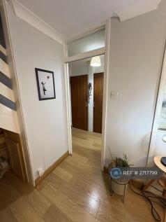 Living Room Into Entrance 2 Cupboards