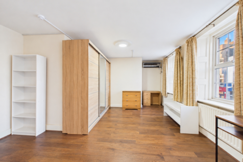 Neat room with golden curtains