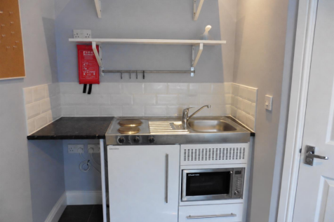 Kitchen corner cleared beneath worktop.png