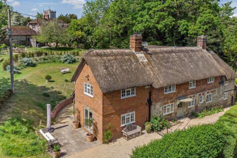 Cottage On The Bank