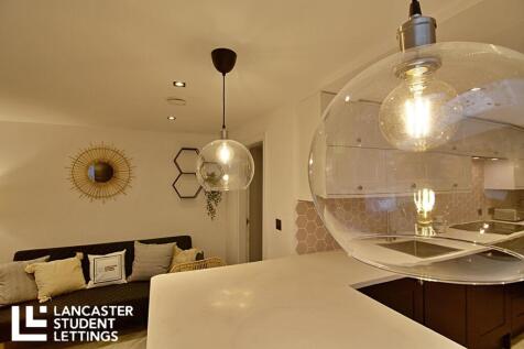 Modern kitchen with stylish pendant lighting...