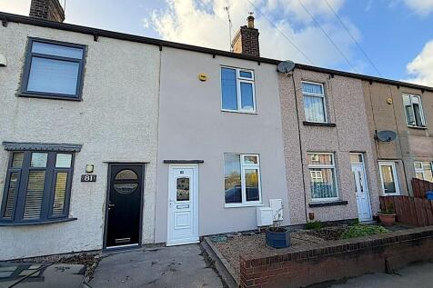 Charming terraced home with a clean facade...