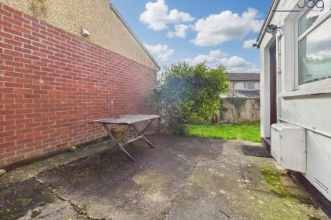 Private rear seating area and lawn