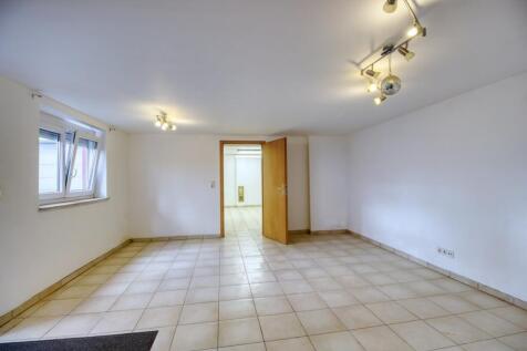 Neubau - Gartengeschoss - zu Wohnraum ausbaubar