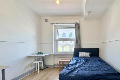Bright and tidy bedroom with dedicated study sp...