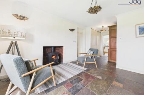 The snug with wood burning stove