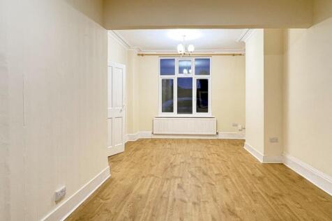 Bright, recently refreshed living room with cle...