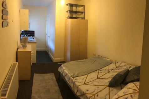 Well-presented furnished bedroom with a cozy do...
