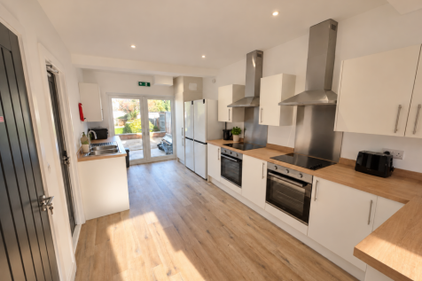 Shared kitchen and dining | AI staged