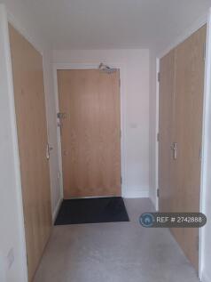 Front Door In Spacious Hallway