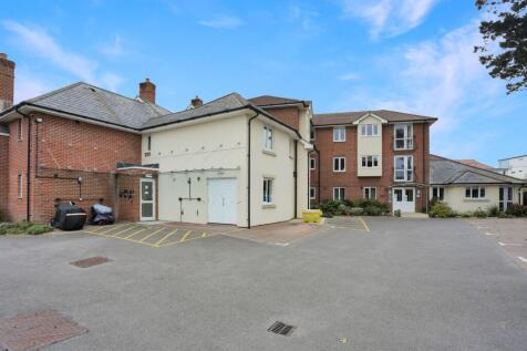 Secure car park with mobility scooter charging unit