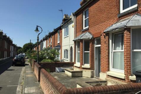Charming terraced house on a sunny street...