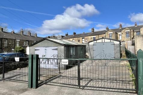 Two Detached Garages &amp; Gated Parking