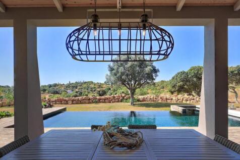 views over the gardens filled with mature trees