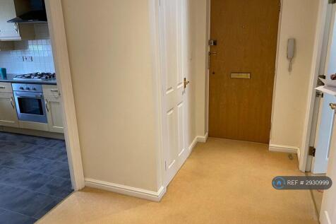 Hallway With Full Height Storage Cupboard