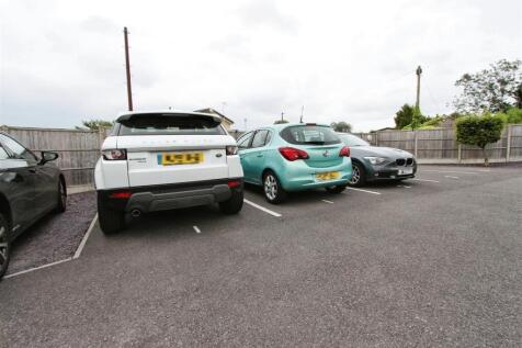 Two Parking Spaces