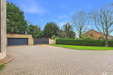 Garage and gates to side / rear working garden