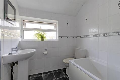 Fully Tiled Family Bathroom