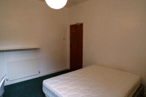 Simple furnished bedroom with a double mattress...