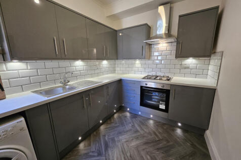 A three bedroom Two reception room house with ups