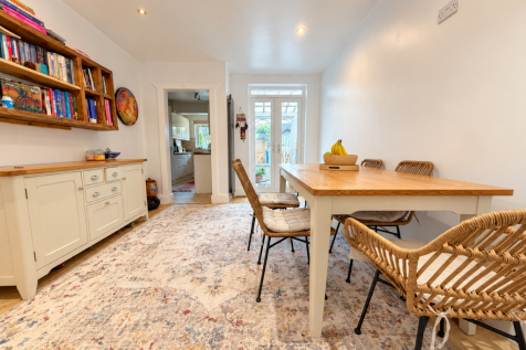 Modern Rustic Dining Room with Garden Views.png