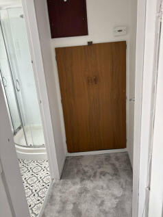 Hall to bath storage