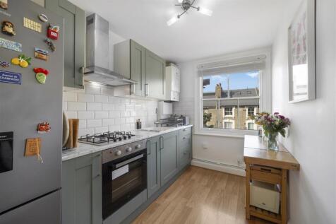 Newly fitted kitchen with marble worktops