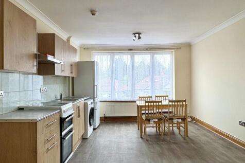 Bright kitchen with spacious dining area...
