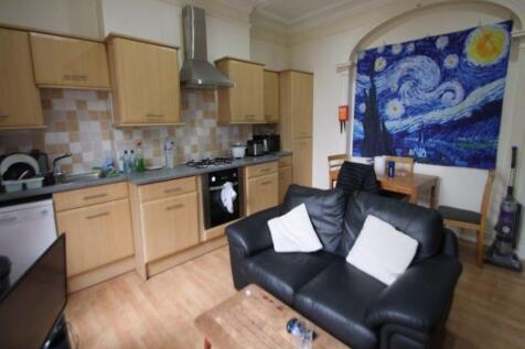 Bright and welcoming kitchen with modern applia...