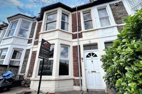 Street-facing bay-front terraced house with a b...