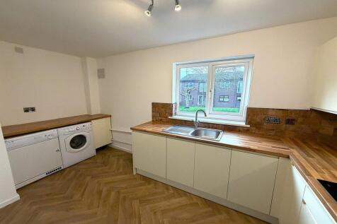 Modern kitchen with laundry facilities....
