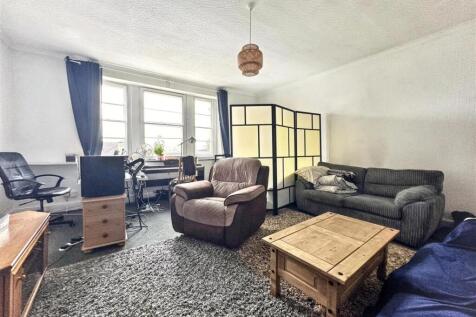 Spacious living area with excellent natural lig...