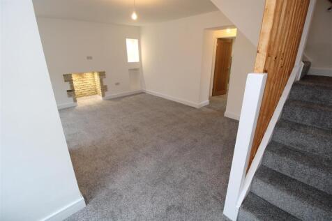 Spacious lounge with fresh grey carpets...