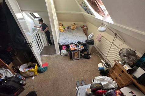 A compact room with potential for storage and p...