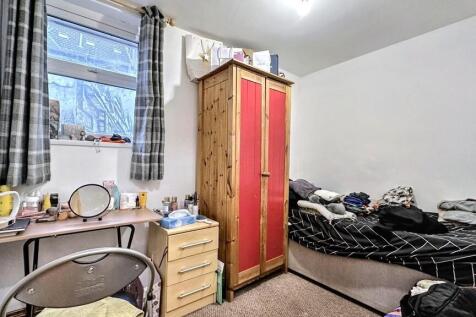 Cozy bedroom with ample storage and study desk...
