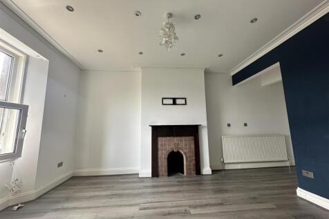 Bright, spacious lounge with modern flooring...