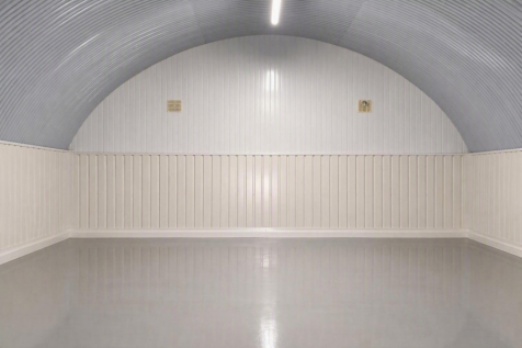 An empty arch with white lining