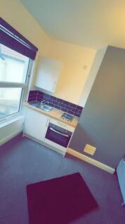 Compact fitted kitchenette with a single oven, ...
