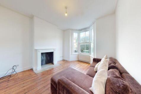 Wooden flooring in reception into bay window