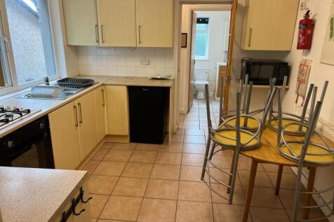 Spacious kitchen with a dining area and window...