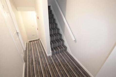 Bright, recently refreshed hallway with pattern...