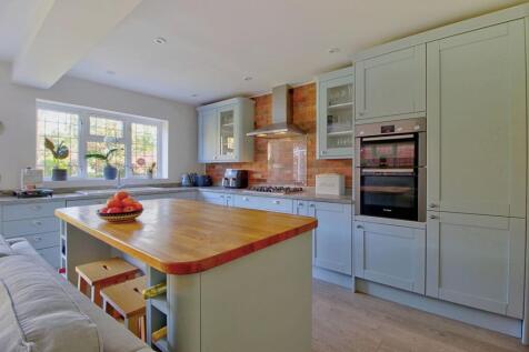Showing island bar and wine storage