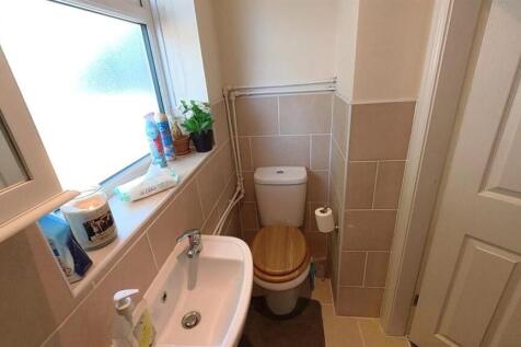 Bright and clean guest toilet with natural ligh...