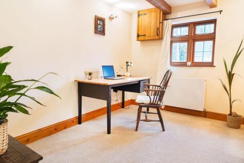 Ground floor study with characterful beams