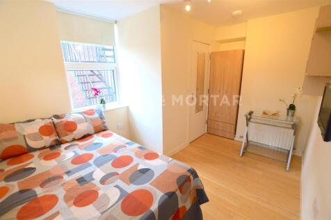 Flat 2, 24 Portland Terrace White Bedroom.jpg