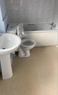 Bathroom Bath with overhead shower