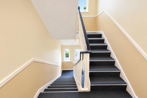 Bright Modern Stairwell with Central Railing.png