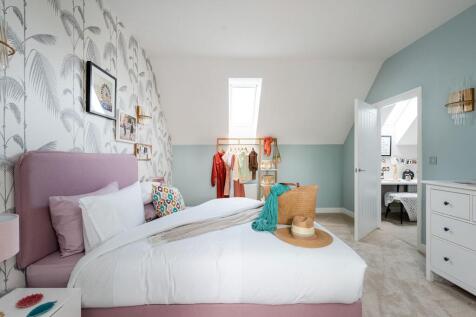 Bedroom two on the top floor is spacious and inviting