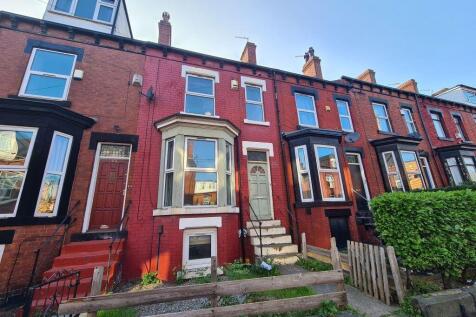 A charming front view of a row of traditional t...