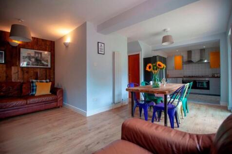 Bright open-plan living and dining area...